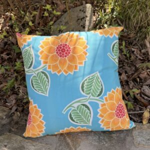 Pillow with flowers and leaves